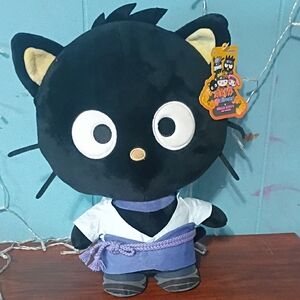 Hello Kitty Black Cat Plush with Purple Outfit and Yellow Ear Accents